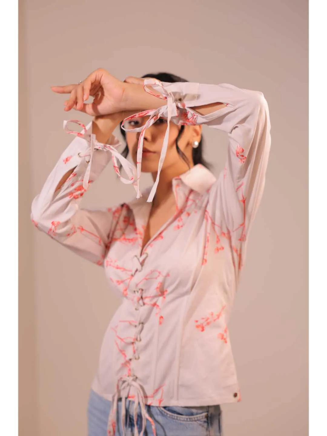 modish cotton lycra floral printed shirt collar corset with front rivets tie-up , full cuff sleeve top . -Off White